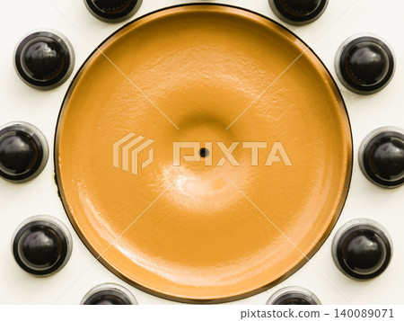 Close up of yellow detailed black bolts Close up of yellow detailed black bolts 140089071