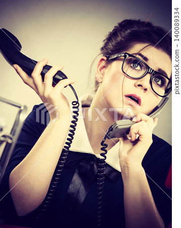 Sleepy business woman in office working Sleepy business woman in office working 140089334