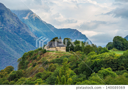 The village of Saint-Savin near Argeles-Gazost with the Pyrenees in the background in the French Pyrenees, France The village of Saint-Savin near Argeles-Gazost with the Pyrenees in the background in the French Pyrenees, France 140089369