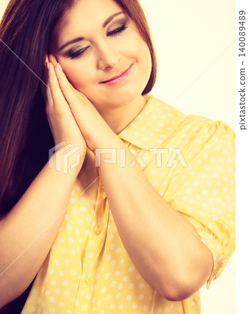 Sleepy calm woman gesturing 140089489