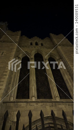 Dublin, Ireland - May 31, 2023: stone church facade with Gothic windows Dublin, Ireland - May 31, 2023: stone church facade with Gothic windows 140089531