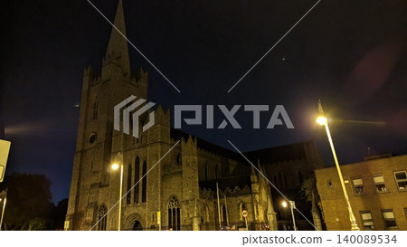 Dublin, Ireland - May 31, 2023: illuminated church architecture in the Liberties district Dublin, Ireland - May 31, 2023: illuminated church architecture in the Liberties district 140089534