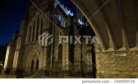 Dublin, Ireland - May 31, 2023: church architecture beneath elevated urban structure Dublin, Ireland - May 31, 2023: church architecture beneath elevated urban structure 140089539