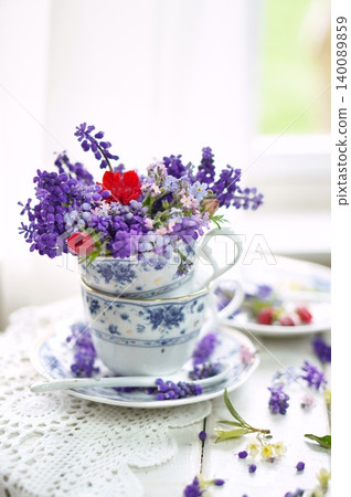 Muscari arrangement on a windowsill Muscari arrangement on a windowsill 140089859