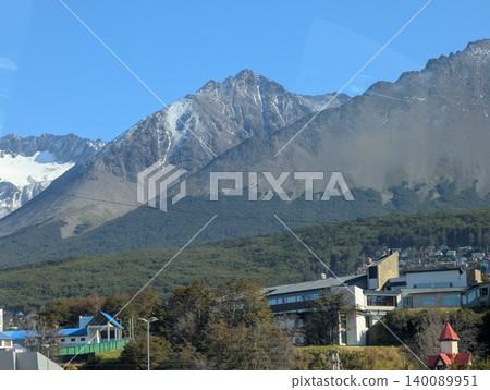 Ushuaia, Tierra del Fuego, Argentina - March 6, 2026: Mountain slopes and urban development in Tierra del Fuego 140089951