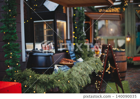 Cozy holiday market food stall decorated Cozy holiday market food stall decorated 140090035