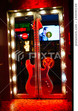 Creative Bar Entrance Featuring Large Electric Guitar Creative Bar Entrance Featuring Large Electric Guitar 140090149
