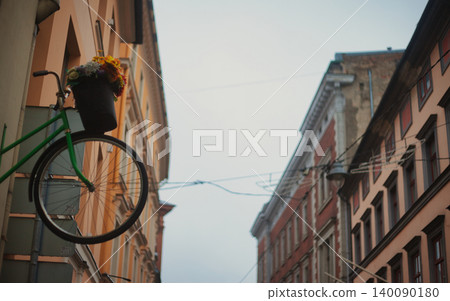 Decorative bicycle mounted on an exterior wall Decorative bicycle mounted on an exterior wall 140090180
