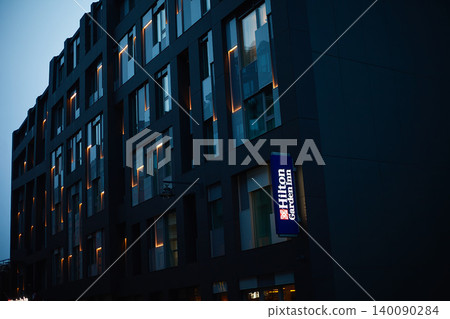 Modern Dark Building Facade of Hilton Garden Inn at Dusk, Contemporary Urban Architecture  140090284