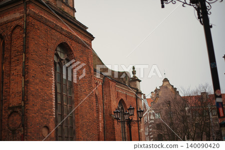 Historical Red Brick Gothic Building with Large Arched Historical Red Brick Gothic Building with Large Arched 140090420