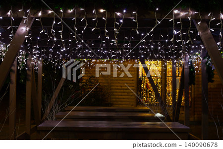 Cozy Outdoor Wooden Pavilion with Hanging Christmas Cozy Outdoor Wooden Pavilion with Hanging Christmas 140090678