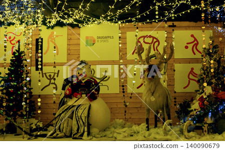 Festive Christmas Display with Hockey Snowman  140090679