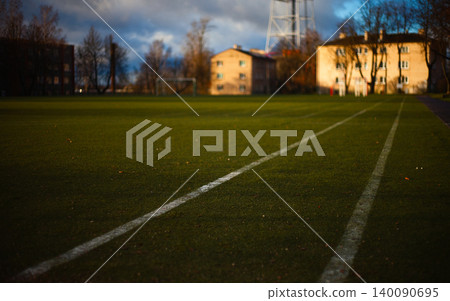 Low Angle View of an Empty Artificial Turf Sports Field Low Angle View of an Empty Artificial Turf Sports Field 140090695