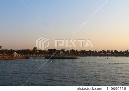 Tranquil Tropical Beach Resort at Sunset Tranquil Tropical Beach Resort at Sunset 140090836