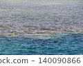 Clear Blue Ocean Water Over Shallow Coral Reef 140090866