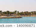 Tropical Beach Resort with Palm Trees and Turquoise Water 140090871