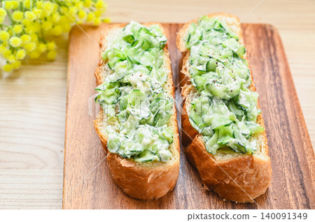 Cucumber and cream cheese open sandwich Cucumber and cream cheese open sandwich 140091349