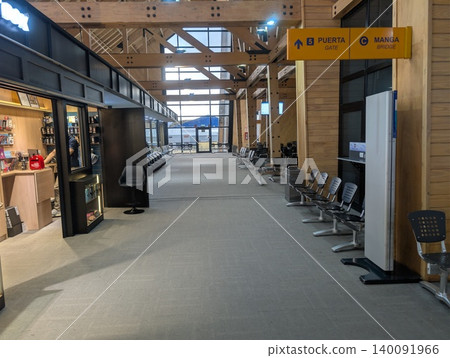 Ushuaia, Tierra del Fuego, Argentina - March 9, 2026: Airport shopping and passenger area in Ushuaia Ushuaia, Tierra del Fuego, Argentina - March 9, 2026: Airport shopping and passenger area in Ushuaia 140091966