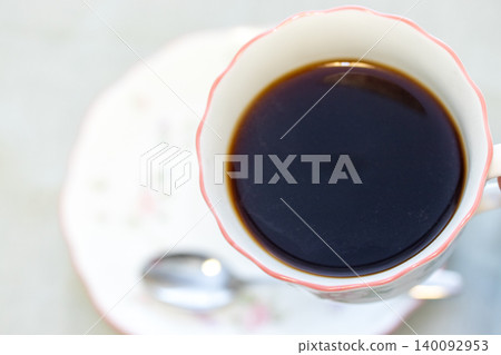 A cup full of coffee A cup full of coffee 140092953
