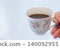 A cup filled with coffee 140092955
