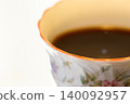 A cup filled with coffee 140092957