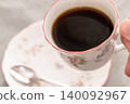 A cup filled with coffee 140092967