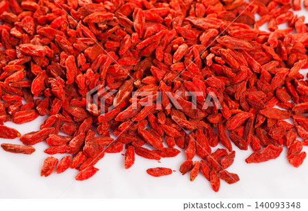 Bried goji berries on white surface Bried goji berries on white surface 140093348