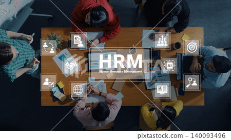 Above View of Team Collaboration on Human Resource Management Strategies with Charts and Icons in a Modern Office Setting Cyphers. Above View of Team Collaboration on Human Resource Management Strategies with Charts and Icons in a Modern Office Setting Cyphers. 140093496