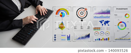 Business Professional Analyzing Data Visualizations and Charts on a Modern Keyboard in a Minimalist Office Setting. Bitwise Business Professional Analyzing Data Visualizations and Charts on a Modern Keyboard in a Minimalist Office Setting. Bitwise 140093526