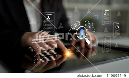 Digital Recruitment Process with Hands Using Tablet, Analyzing Resumes and Candidates, Graphic Overlays on Screen Cyphers. 140093549