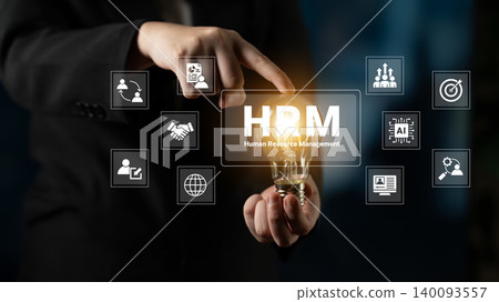 Business professional interacting with human resource management concept displayed on transparent screen with glowing light bulb Cyphers. 140093557
