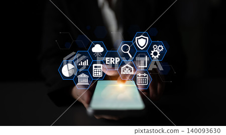 Modern Business Technology with Abstract Icons Representing ERP, Data Analysis, and Digital Transformation on a Smartphone in Dark Background Fluxor Modern Business Technology with Abstract Icons Representing ERP, Data Analysis, and Digital Transformation on a Smartphone in Dark Background Fluxor 140093630
