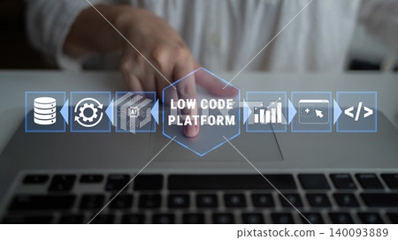 Hand on Laptop Touchpad with Low Code Platform Interface for Digital Transformation and Software Development Efficiency in Modern Business Solutions Quark Hand on Laptop Touchpad with Low Code Platform Interface for Digital Transformation and Software Development Efficiency in Modern Business Solutions Quark 140093889