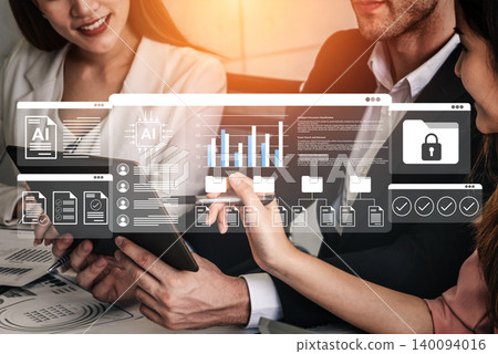 Business professionals discussing data analytics and artificial intelligence concepts in a modern workspace with virtual interfaces and graphs displayed. Gantry Business professionals discussing data analytics and artificial intelligence concepts in a modern workspace with virtual interfaces and graphs displayed. Gantry 140094016