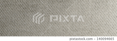 Gray woven textile fabric forming a geometric pattern with diagonal lines Gray woven textile fabric forming a geometric pattern with diagonal lines 140094665