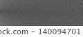 Dark gray abstract textured background showing a subtle central gradient effect with scattered noise 140094701