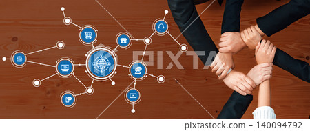 Collaborative Teamwork in Business Strategy Concept with Global Connectivity and Technology Icons Over a Wooden Table Background. Amity 140094792
