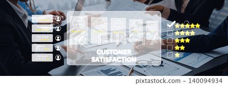 Business Team Collaborating on Customer Satisfaction Metrics with Feedback Ratings and Analysis on a Modern Office Table Trope Business Team Collaborating on Customer Satisfaction Metrics with Feedback Ratings and Analysis on a Modern Office Table Trope 140094934