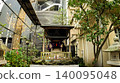Inari Kio Shrine in Shinjuku, Tokyo, surrounded by the city's skyscrapers. 140095048