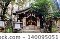 Inari Kio Shrine in Shinjuku, Tokyo, surrounded by the city's skyscrapers. 140095051