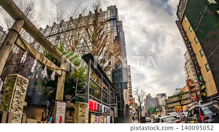 Inari Kio Shrine in Shinjuku, Tokyo, surrounded by the city's skyscrapers. Inari Kio Shrine in Shinjuku, Tokyo, surrounded by the city's skyscrapers. 140095052