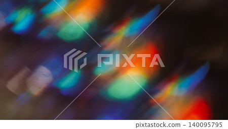 Bokeh spark light. Blur soft crystal. Defocused fluorescent blue red color lens flare flicker beam on abstract art dark black background. 140095795