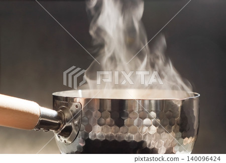 Steam rising from a Yukihira pot Steam rising from a Yukihira pot 140096424