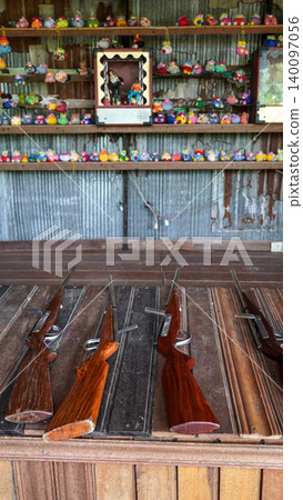 Vintage shooting gallery game at a traditional festival Vintage shooting gallery game at a traditional festival 140097056