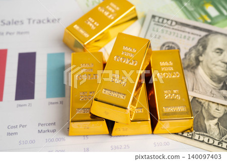 Gold bars with US dollar and Euro banknote money, finance trading investment business currency. 140097403