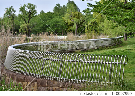 Metal fence installed around the pond in Toneri Park Metal fence installed around the pond in Toneri Park 140097990
