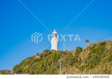 A white lighthouse stands out against the clear blue sky of Omaezaki City (Shizuoka Prefecture). A white lighthouse stands out against the clear blue sky of Omaezaki City (Shizuoka Prefecture). 140098480