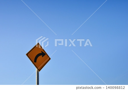 Road sign for a right curve Road sign for a right curve 140098812