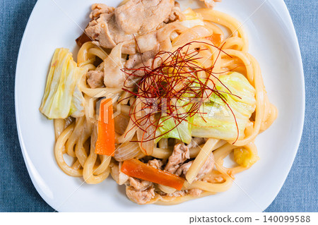 Miso-grilled udon: A photo of a Japanese-style udon dish with stir-fried pork and vegetables. Miso-grilled udon: A photo of a Japanese-style udon dish with stir-fried pork and vegetables. 140099588