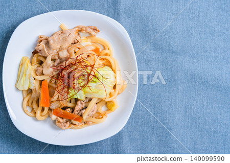 Miso-grilled udon: A photo of a Japanese-style udon dish with stir-fried pork and vegetables. Miso-grilled udon: A photo of a Japanese-style udon dish with stir-fried pork and vegetables. 140099590